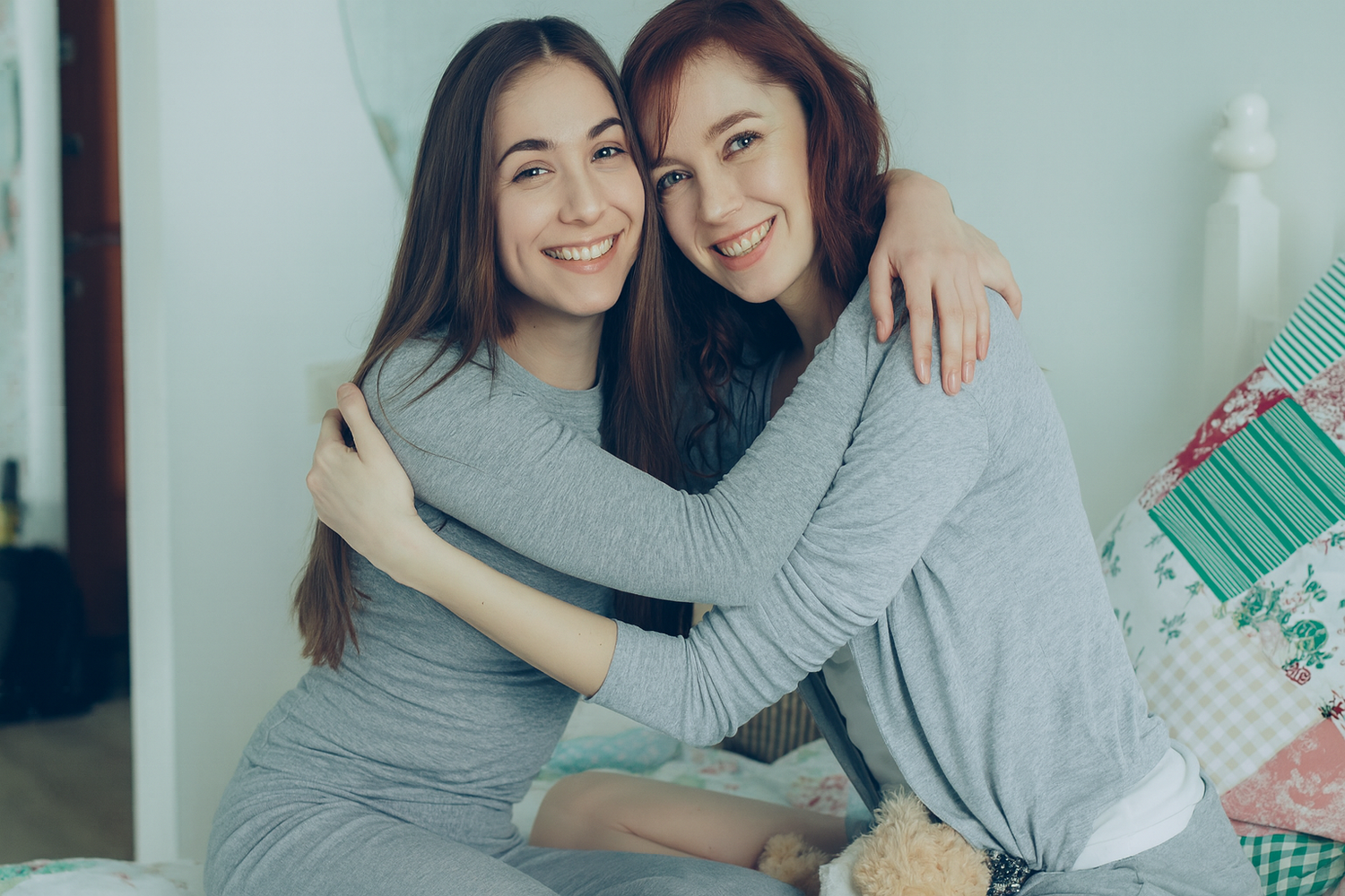 Mother and daughter hugging